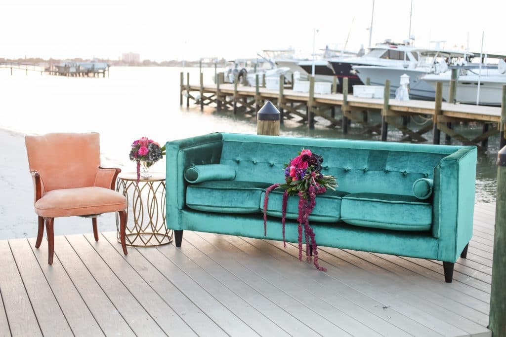 A Chair Affair - velvet couch on dock