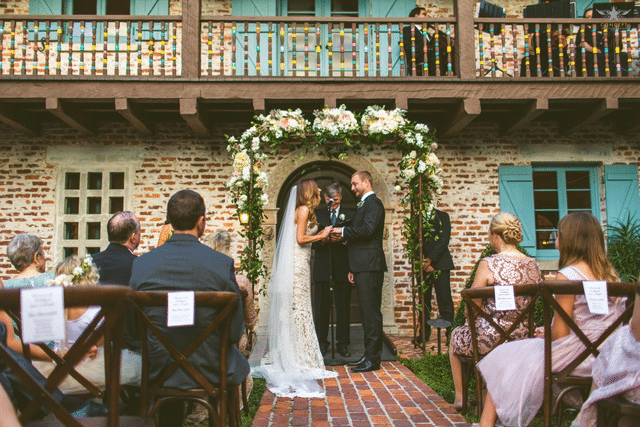 Casa Feliz - bride and groom exchanging vowes