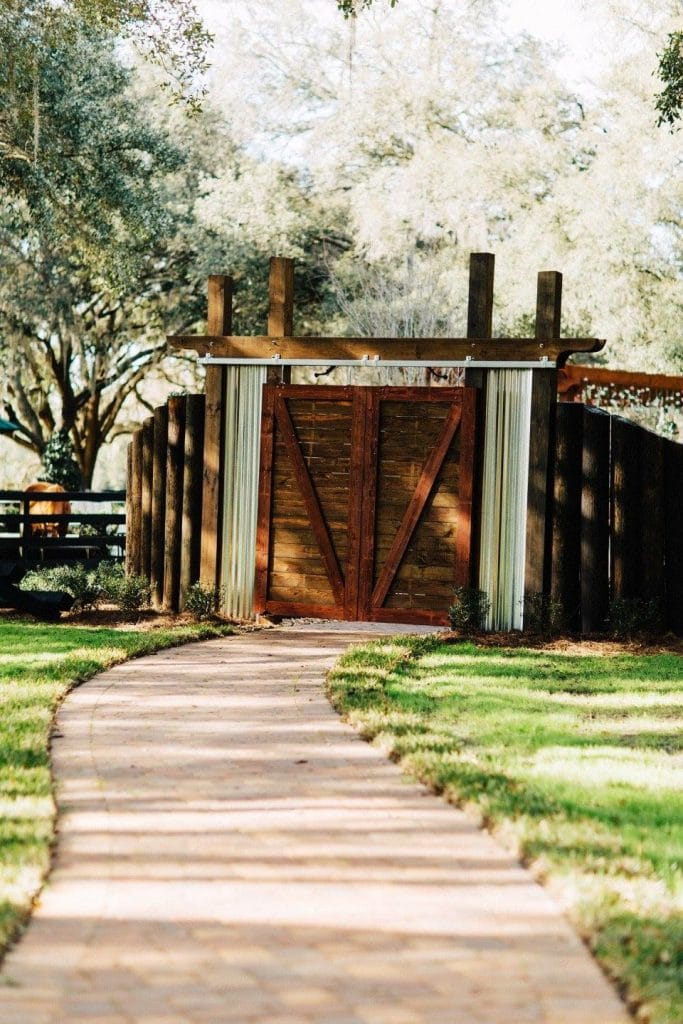 Club Lake Plantation - rustic barn-inspired gate