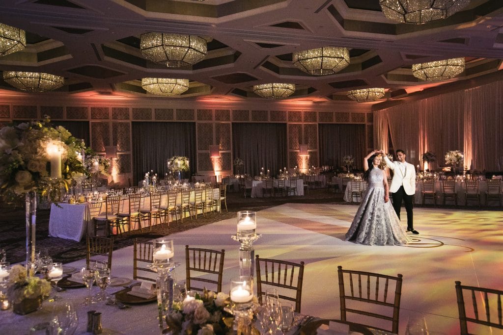 indoor reception, bride and groom dancing, uplighting, candlelit centerpieces, Orlando, Four Seasons Orlando at Walt Disney World Resort