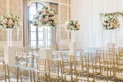 very tall floral arrangements at the wedding ceremony, indoors, Four Seasons Orlando at Walt Disney World Resort