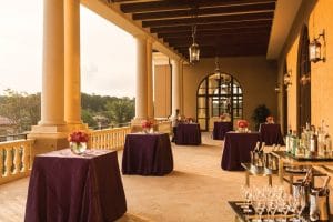 Four-Seasons-at-Walt-Disney-World-Small tables set up for cocktail hour on outdoor veranda