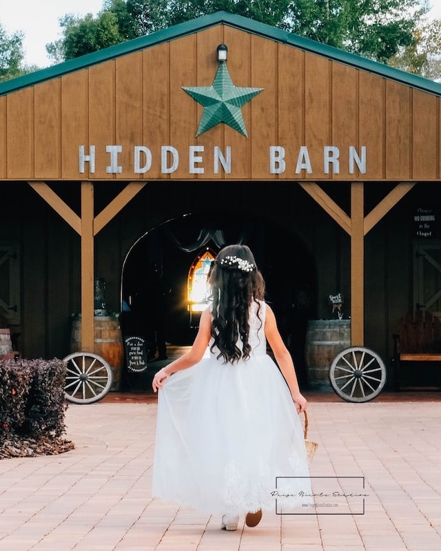 Hidden Barn bride walking up to the Hidden Barn