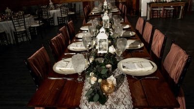 Hidden Barn long table set for wedding reception
