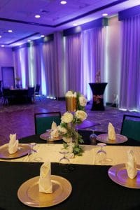 tables cape, white runner, black tablecloth, candles, white floral centerpiece, Orlando, FL