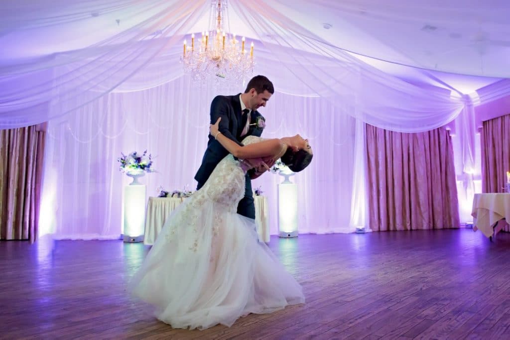 The-Highland-Manor-Groom dipping Bride during their dance on the dance floor