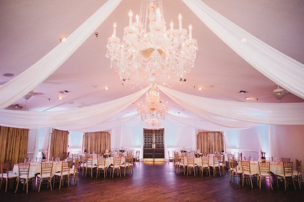 The-Highland-Manor-Gorgeous chandelier with white fabric swoops