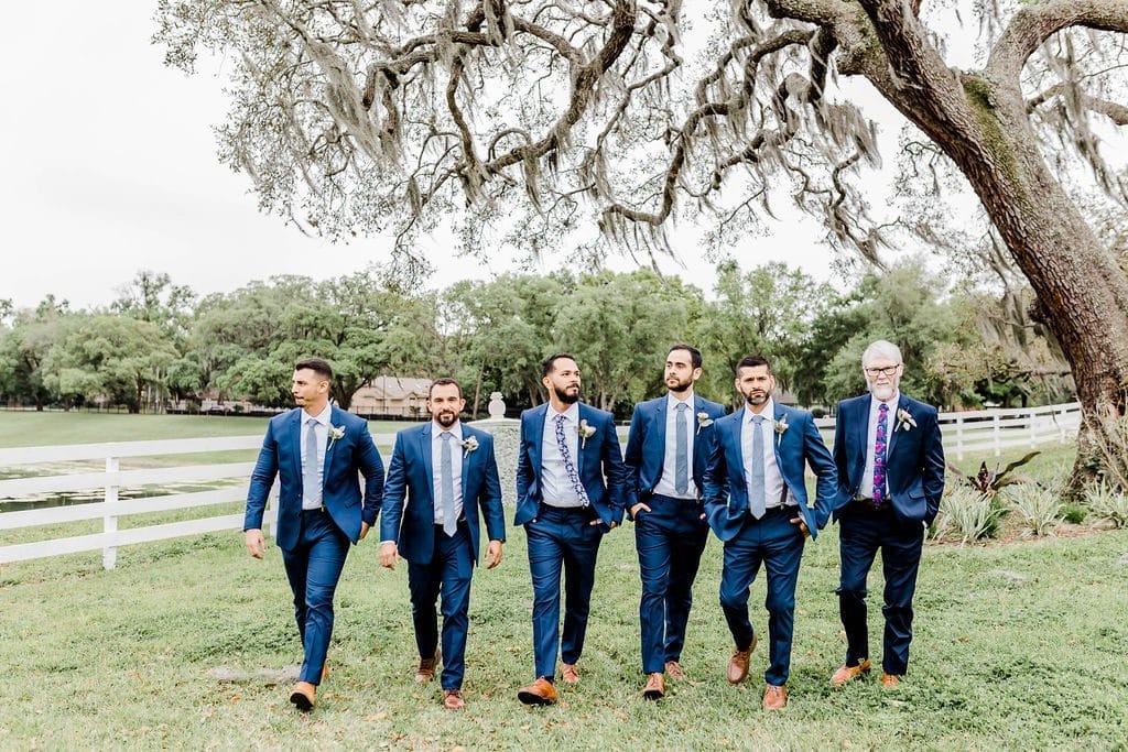 The-Highland-Manor-Groomsmen walking as a group outdoors
