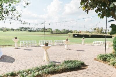 outdoor area, high top tables, twinkle lights hung above, Orlando, FL