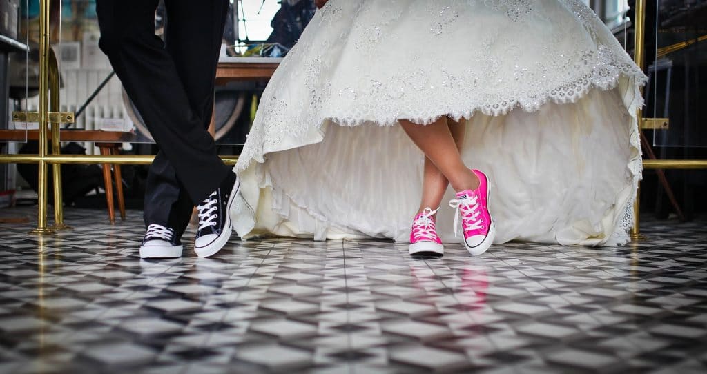 bride and groom with sneakers