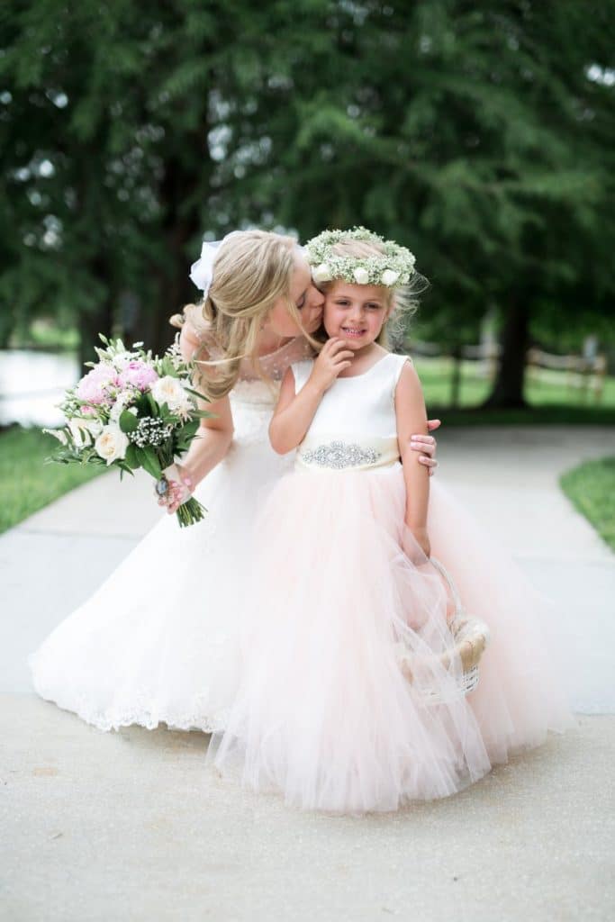 Flower girls outdoors with pretty posey and floral headbands
