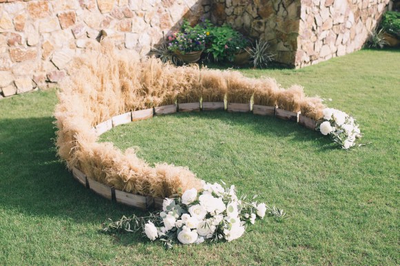 Grass arch on lawn for wedding ceremony