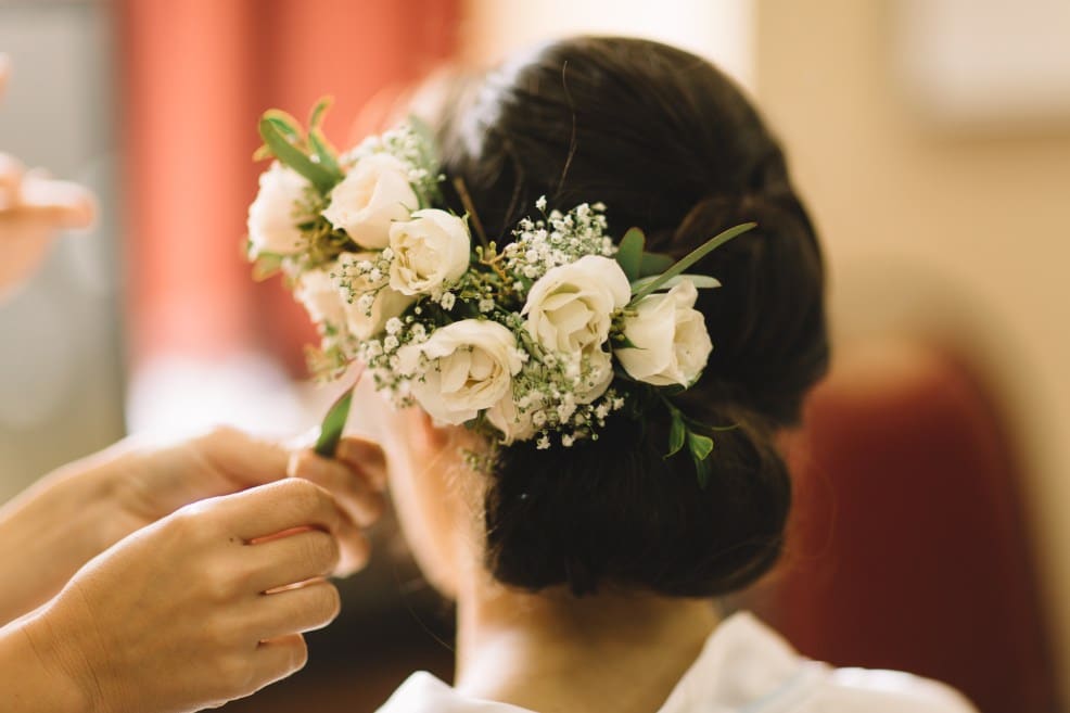 Bride with white roses in her hair by Bluegrass Chic