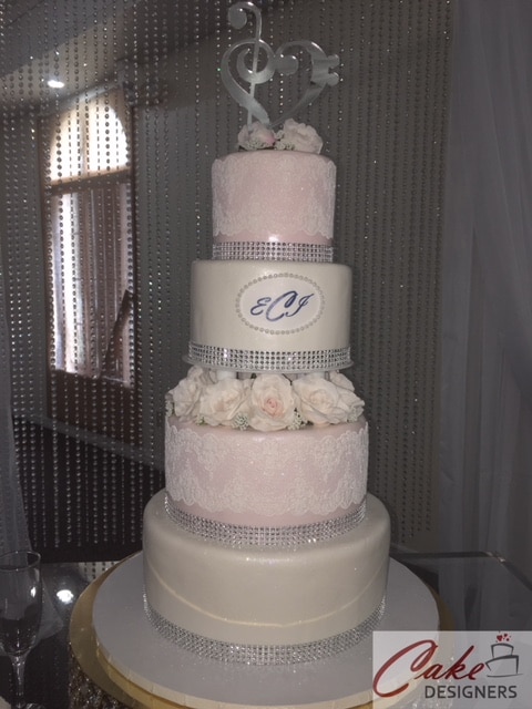 Cake Designers - white and silver wedding cake with lace