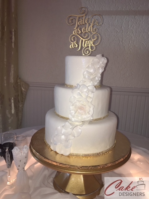 Cake Designers - simple white cake with cascade of flowers