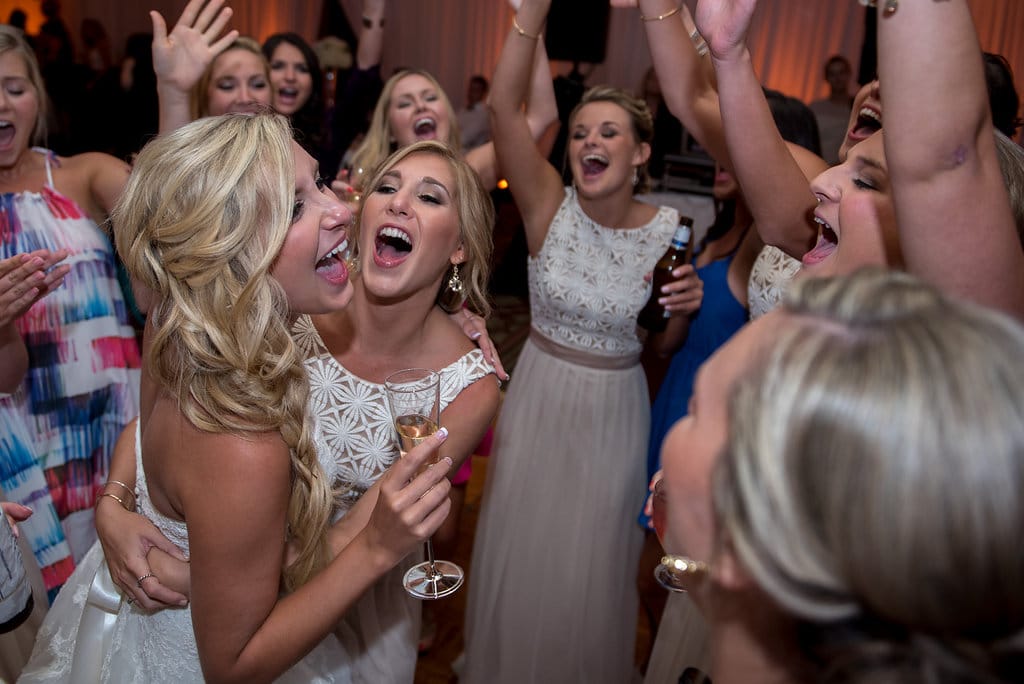 Our DJ Rocks - bridal party cheering on dance floor