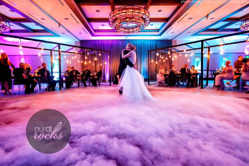 Our DJ Rocks - bride and groom dancing on a cloud at reception at the Alfond Inn