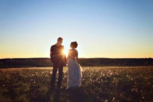 Rhodes Studios, photography and video, back of bride and groom with setting sun, Orlando, FL