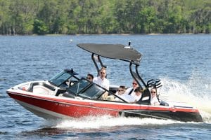 Rhodes Studios, photography and Video, groom and groomsmen in speedboat, Orlando, FL