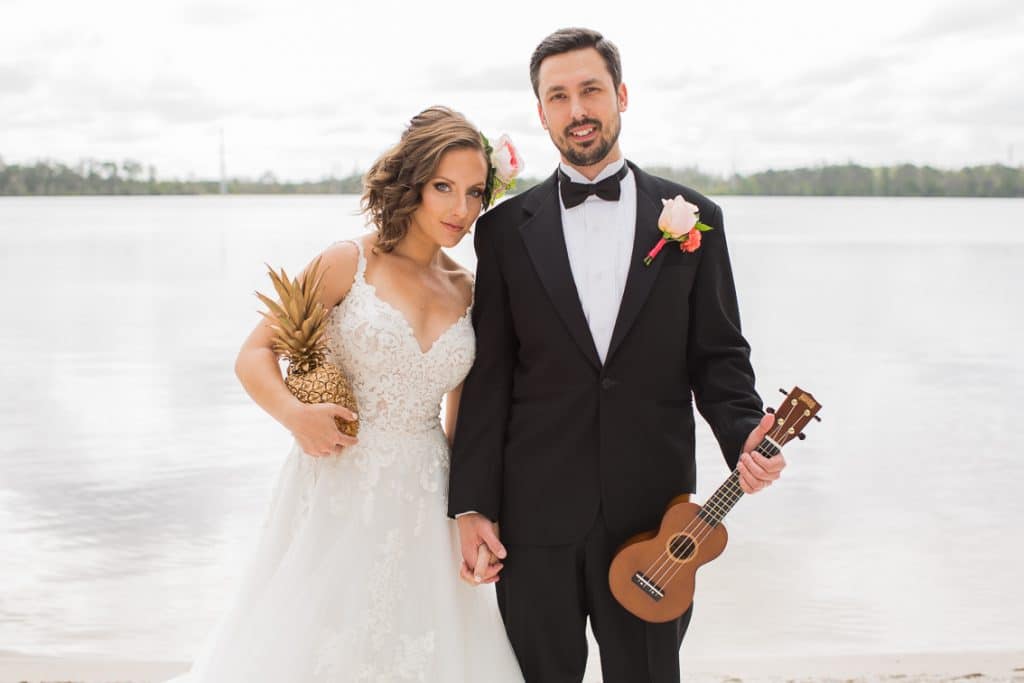 Lori Barbely - couple posing with ukulele and pineapple