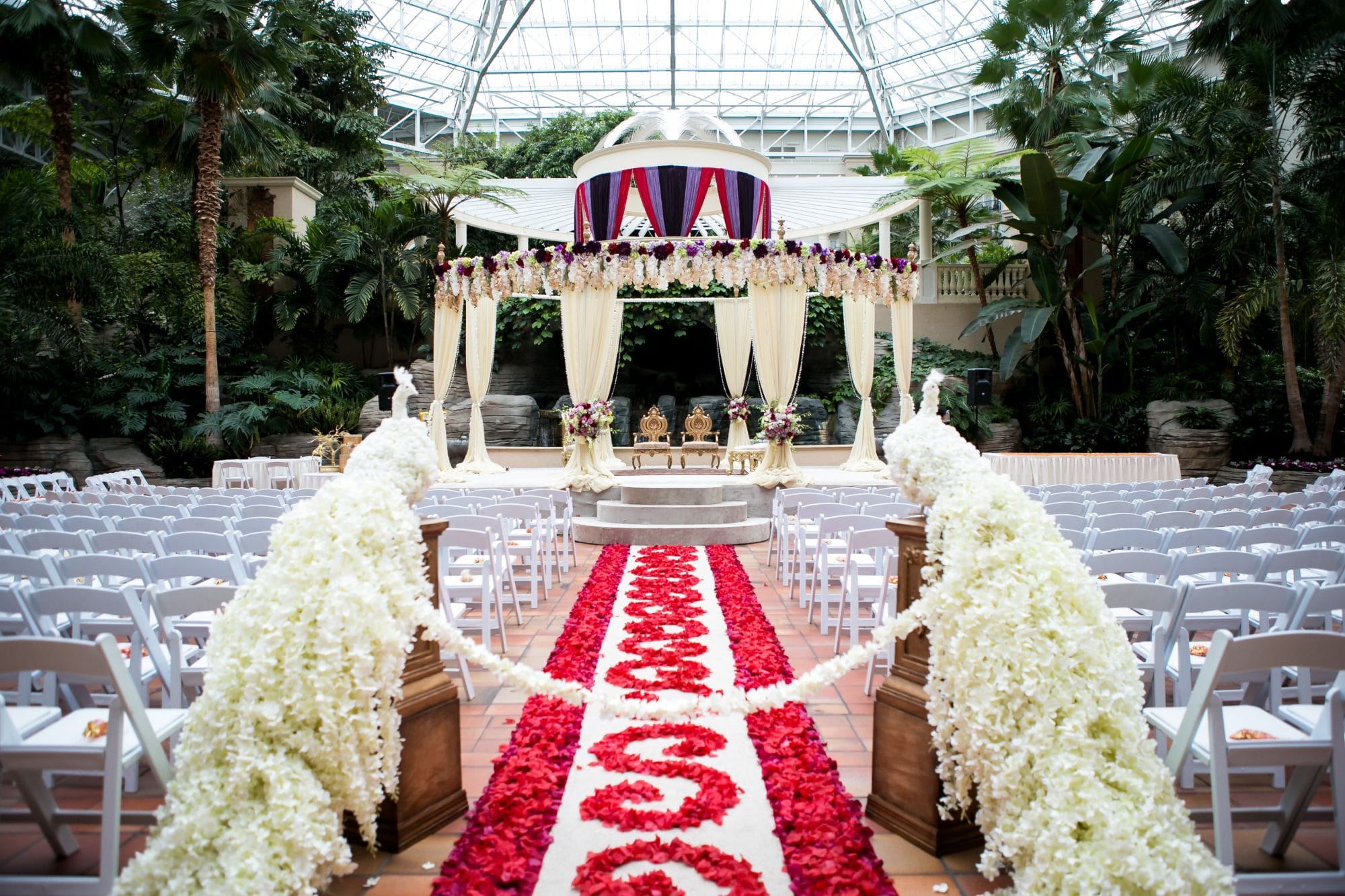 stunning south asian wedding ceremony festooned with flowers