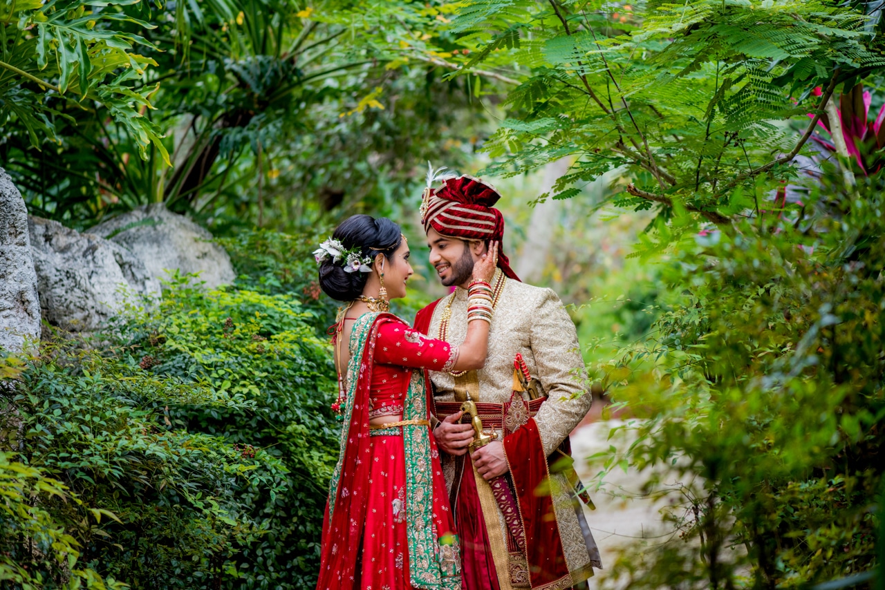 Sona Photography - South Asian bride and groom in lush foliage setting
