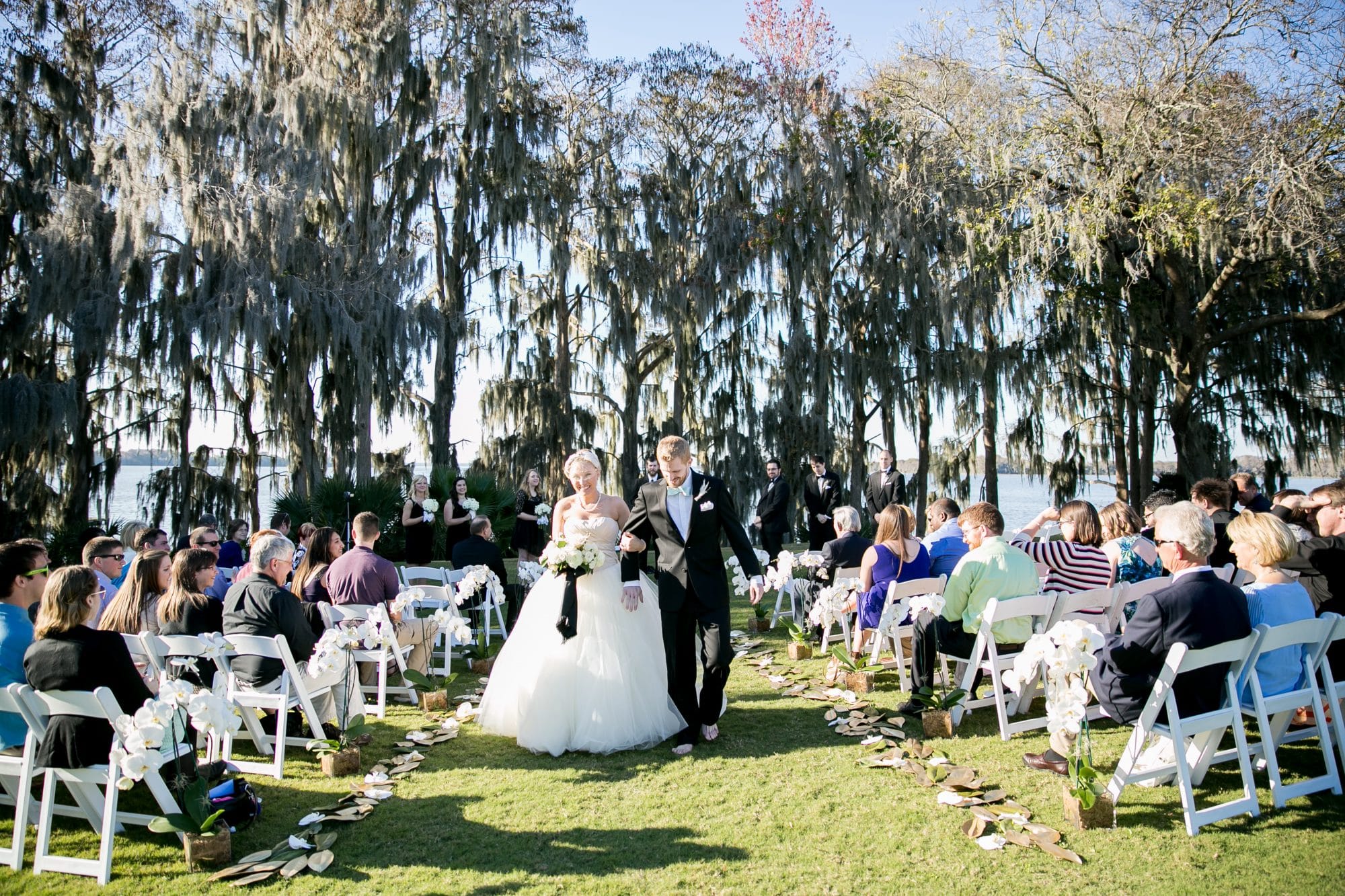 Mission Inn Resort and Club - outdoor ceremony beneath moss covered trees