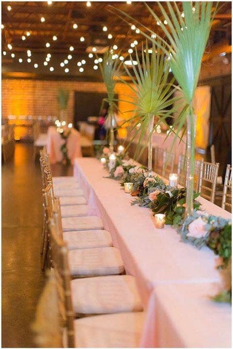 Palm frond table decor and center pieces from Atmospheres Floral