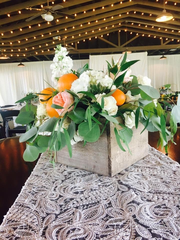 Atmospheres Floral shows rustic centerpiece box with citrus fruits and flowers for a southern feel