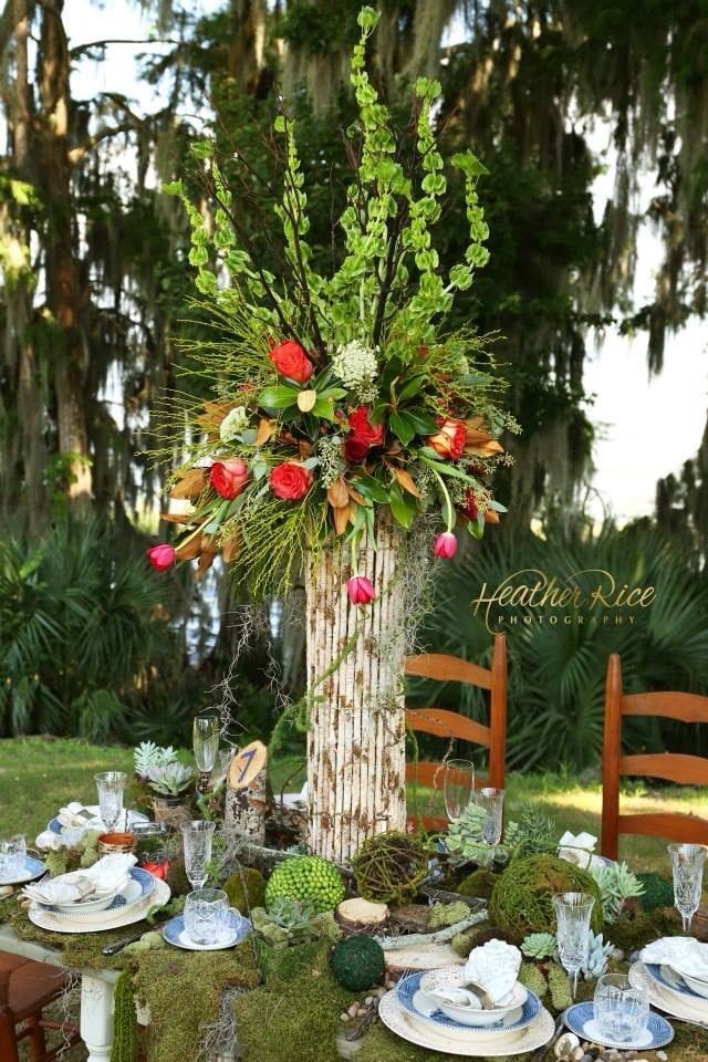Atmospheres Floral - tall centerpiece on mossy foxtail table