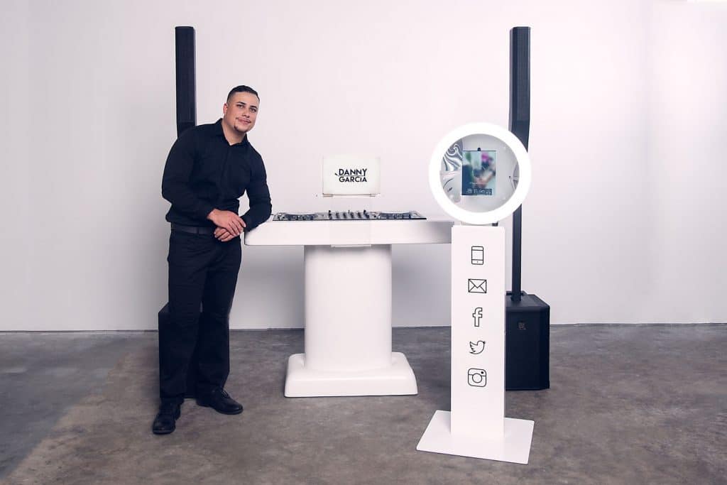 DJ Danny Garcia standing next to his setup