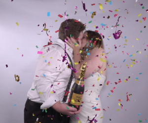 Omarvelous Productions - newlyweds kissing while confetti rains down