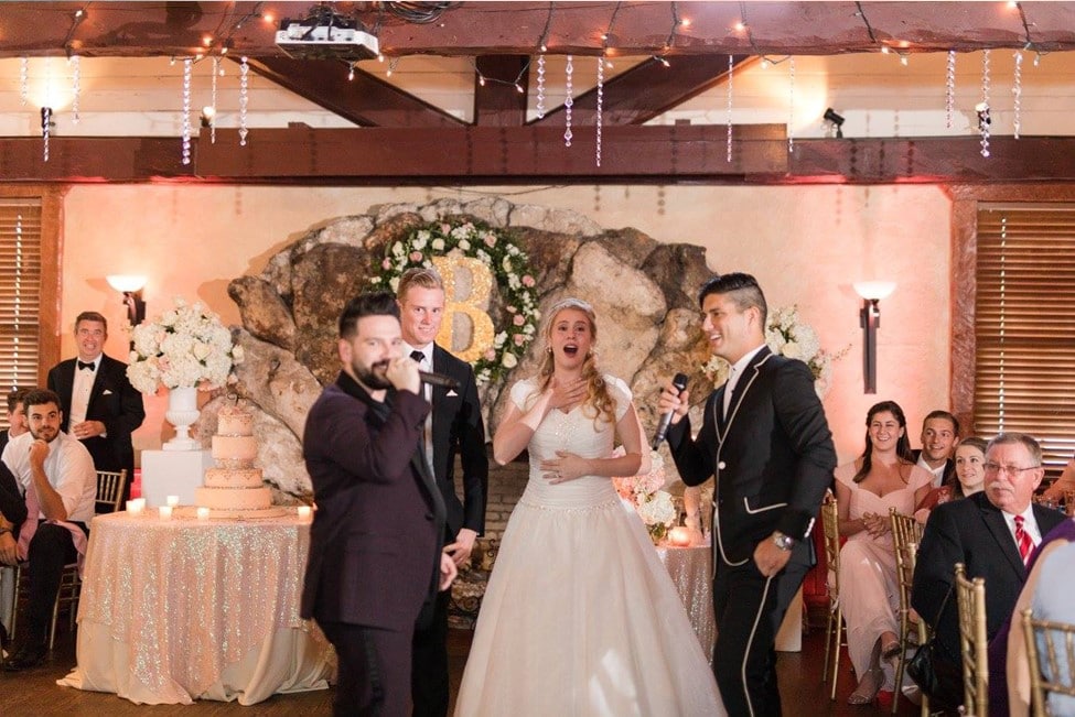 Singers Dan and Shay performing for surprised bride