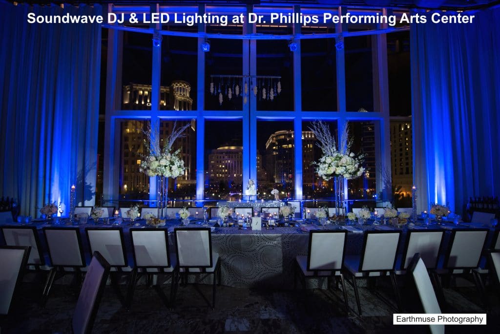 blue lights on wedding reception table by Soundwave Entertainment