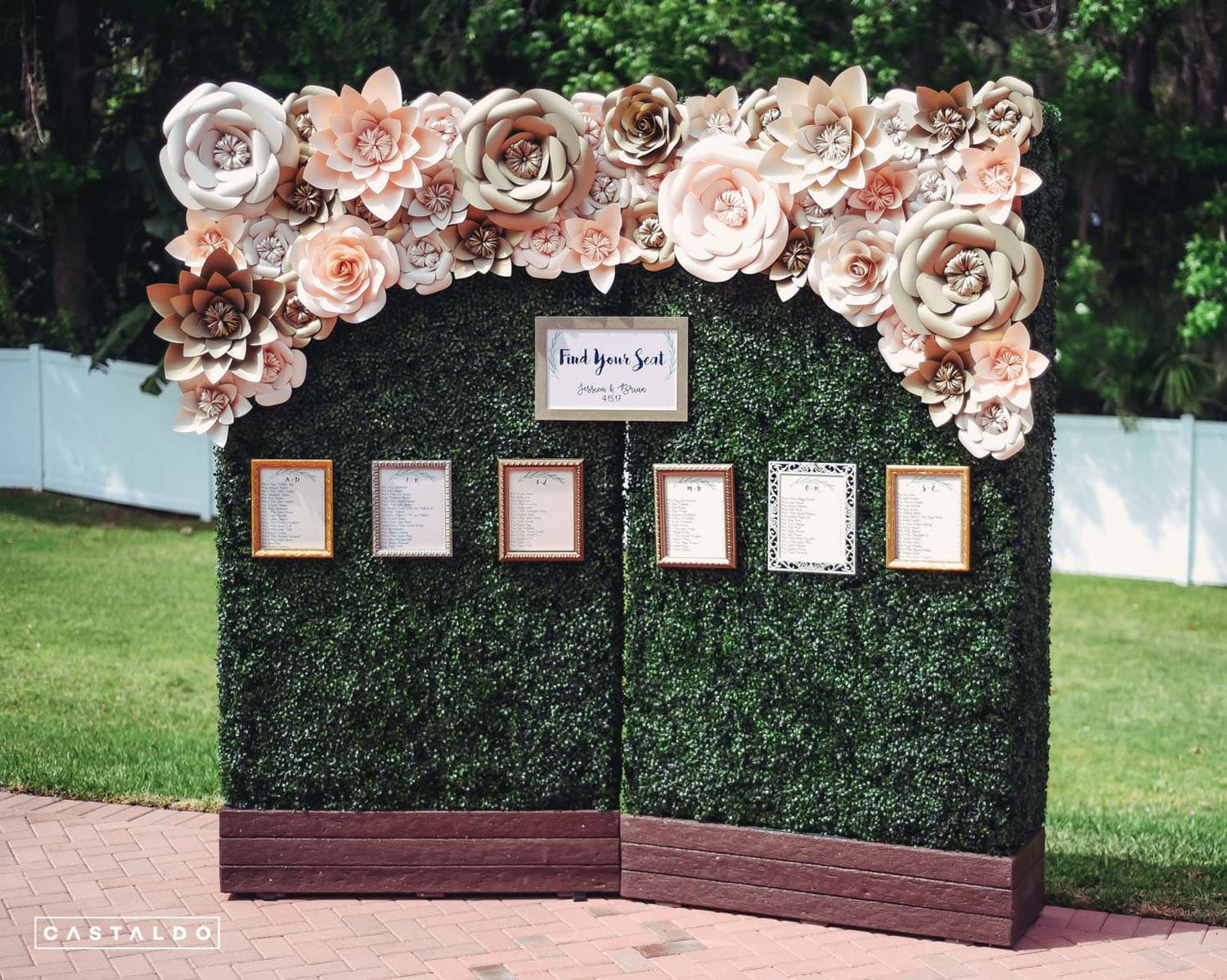 Dazzling Deco - seating chart wall with vines and oversized flowers