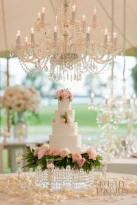 Everything Cake - sweet pink cake under crystal chandelier