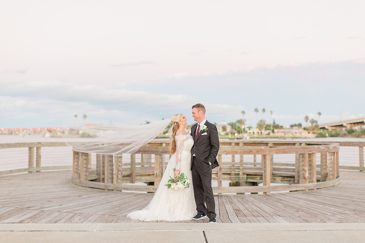 Brannon Center - bride and groom on circular waterfront deck