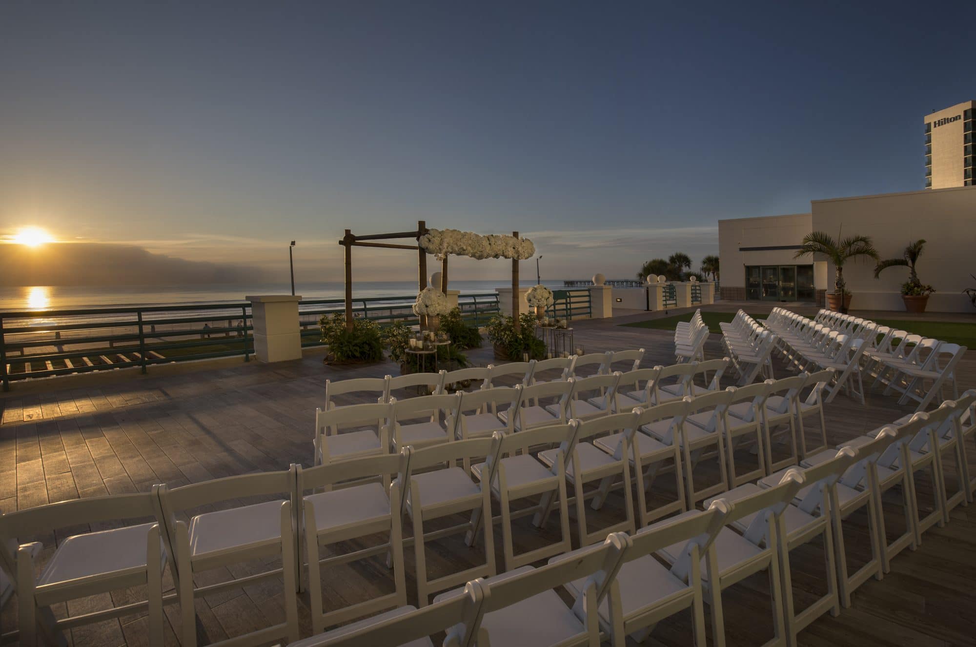 Hilton Daytona Beach Oceanfront Resort - wedding ceremony set up on patio overlooking the ocean