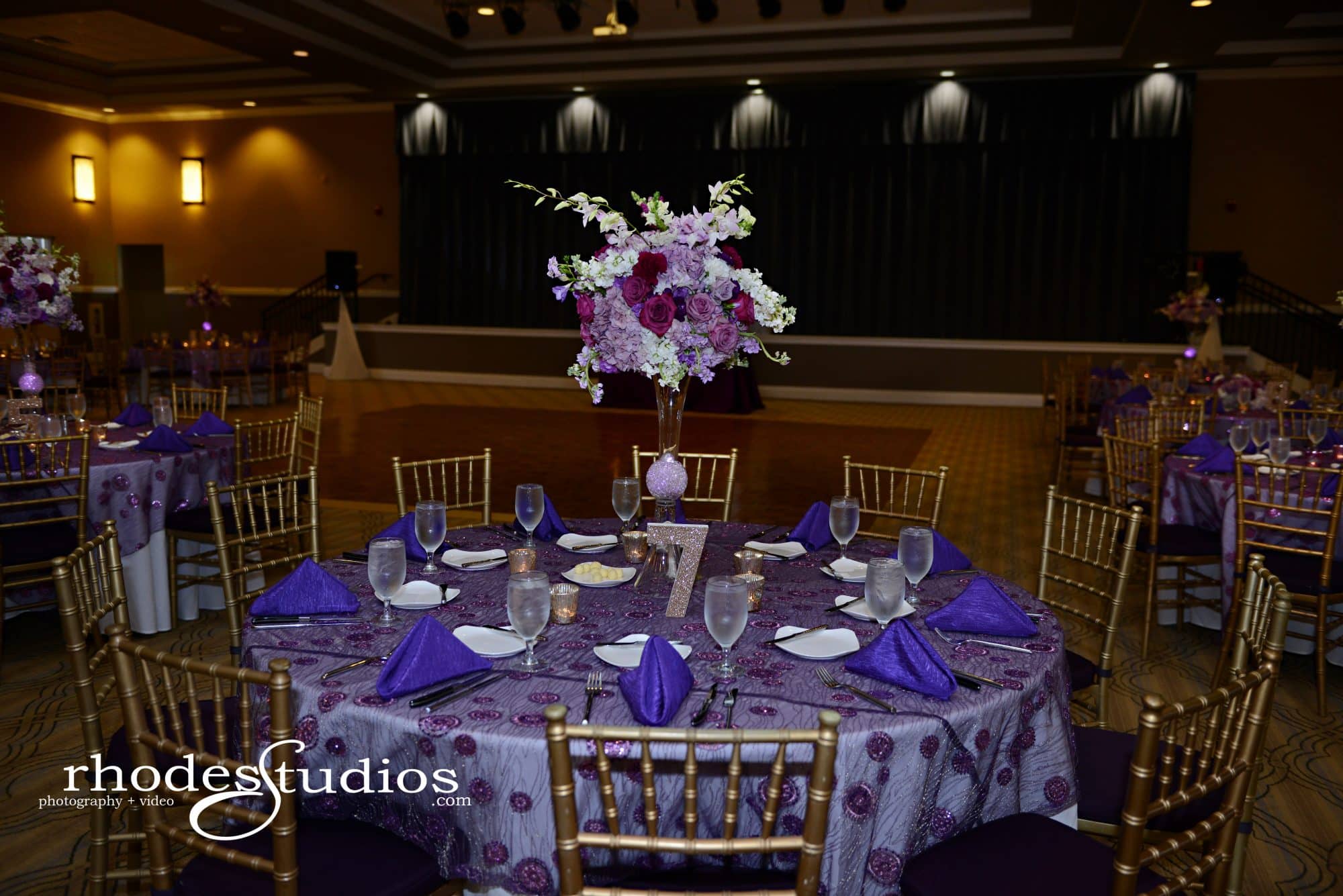 Magnolia House - reception table decorated in shades of purple