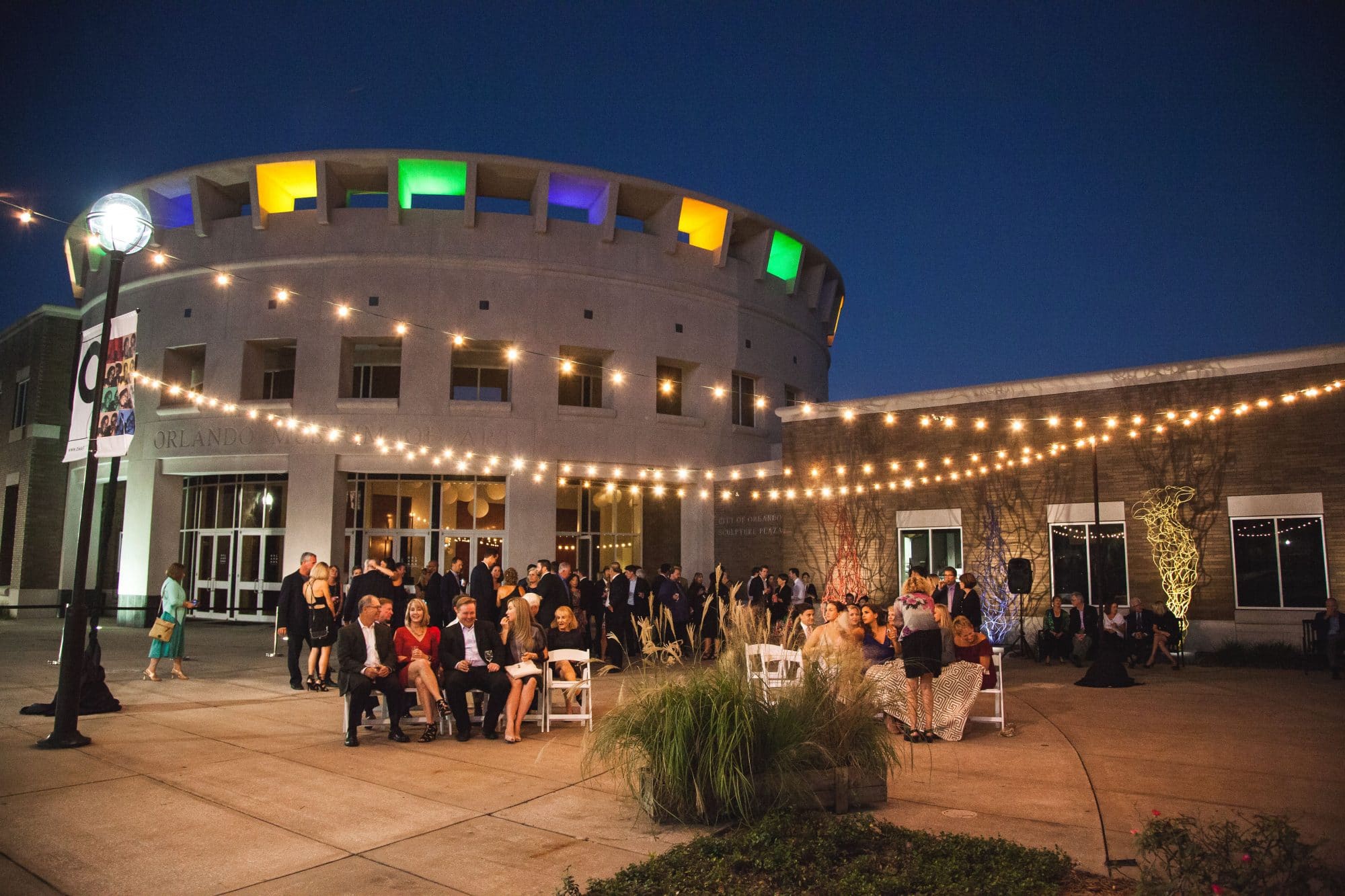 Orlando Museum of Art - outdoor ceremony on patio strung with market lighting