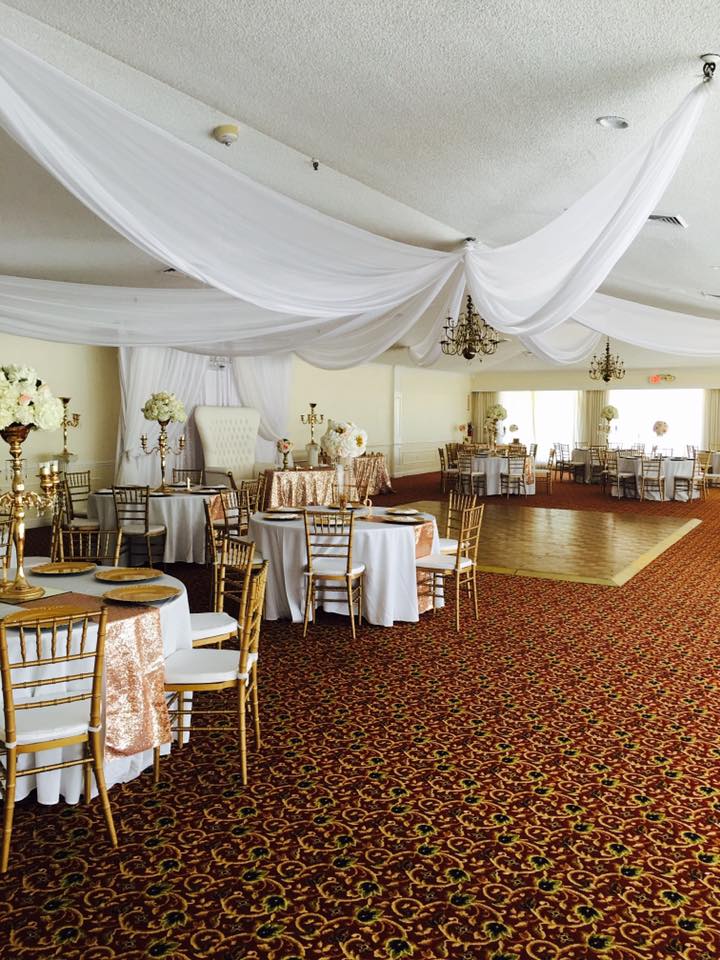 Rio Pinar Golf Club - grand reception hall with white ceiling drapes