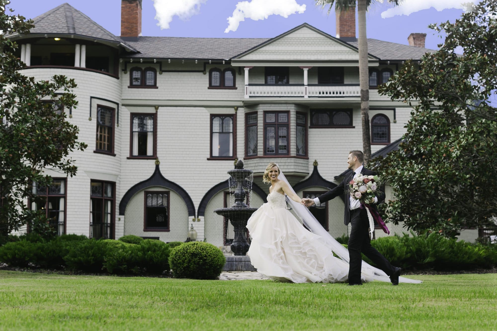 Stetson Mansion - bride and groom outside of charming Victorian mansion