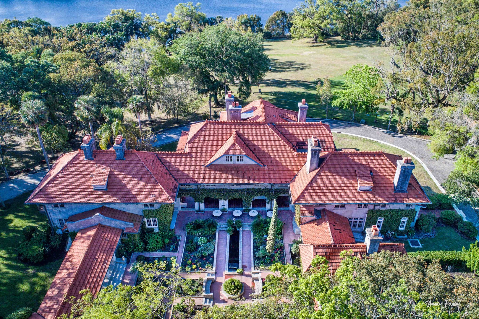 Sydonie Mansion - aerial shot of old mansion with Spanish tile roof