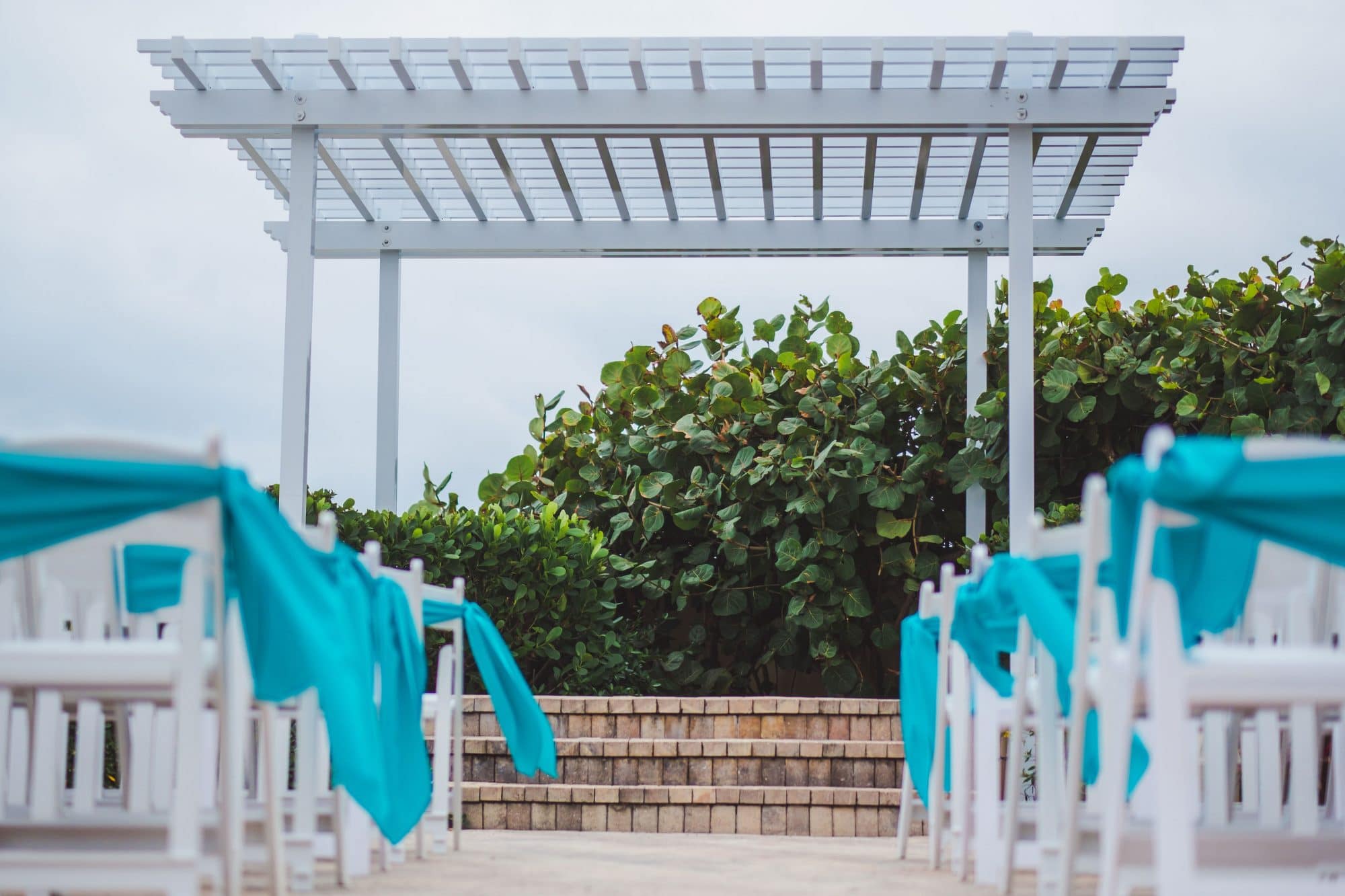 The Shores Resort and Spa - white pergola for wedding ceremony