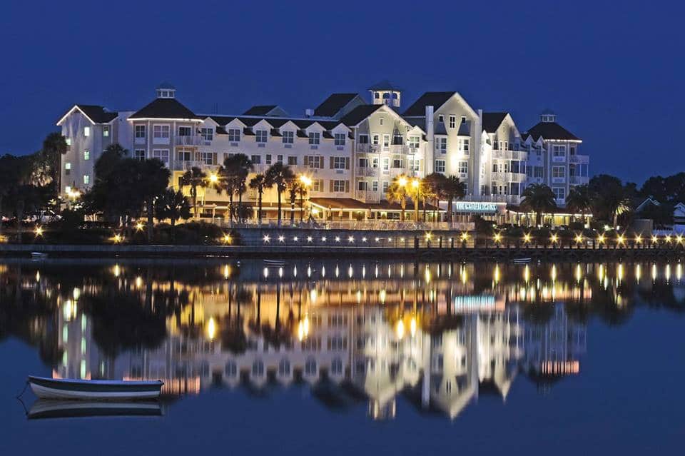 Waterfront Villages - boutique hotel reflected in the lake at twilight