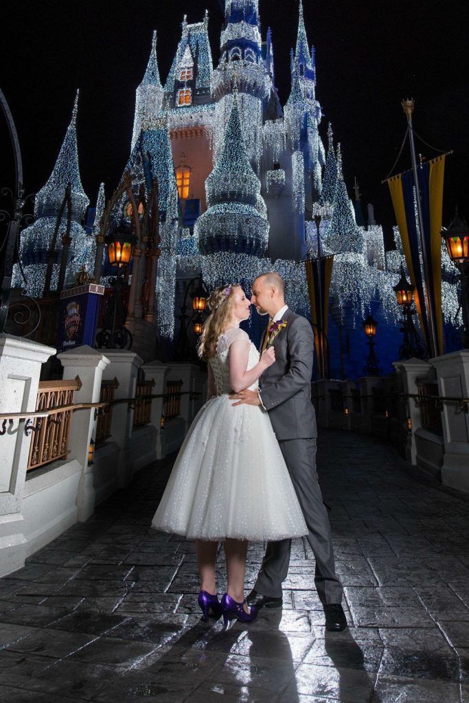couple in front of a castle just married by Hearts & Souls Officiant an Orlando Wedding Officiant