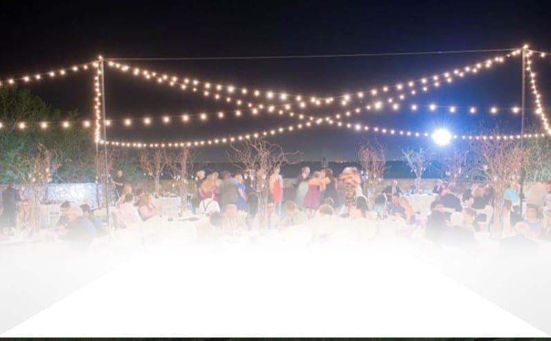 I Rent Everything - outdoor reception strung with market lighting