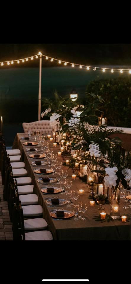 I Rent Everything - long reception table lit by lanterns and tealights
