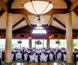 Sugar-Mill-Country-Club-Indoor recpetion area with different table configuration with large windows