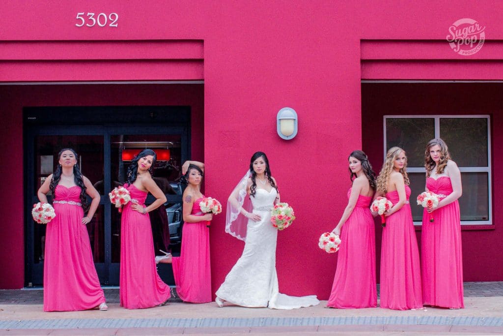 Sugar Pop Productions - gorgeous bride with bridesmaids in hot pink dresses